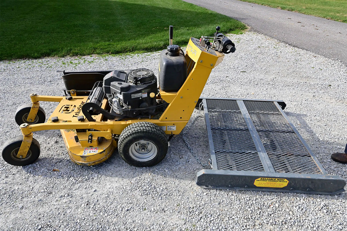 Pull with a walk behind mower